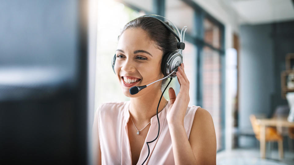 Cropped shot of an attractive young woman working in a call center.