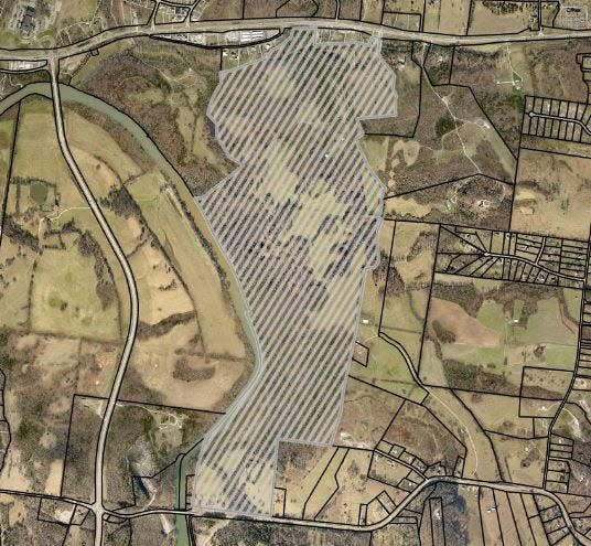 An aerial view of the proposed Columbia Bluffs mixed-use development, which would include 800 residential spaces and a daycare facility off Bear Creek Pike.