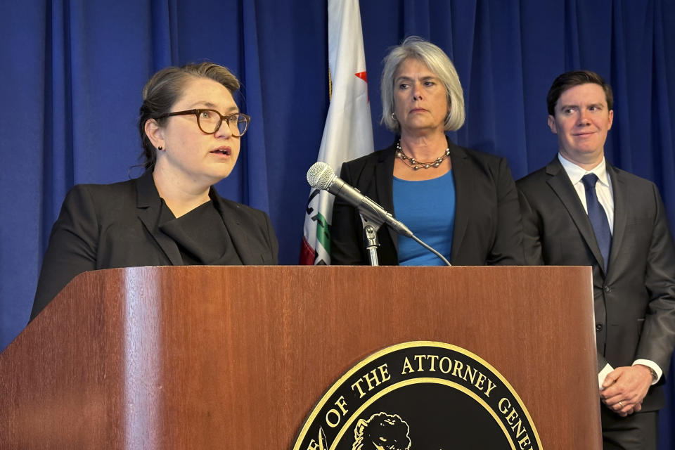 Megan Kirkeby, deputy director for housing policy development for the California Department of Housing and Community Development, speaks during a news conference in Sacramento, Calif., on Monday, May 1, 2023. Kirkeby announced a lawsuit against the city of Elk Grove for not approving an apartment complex for people experiencing homelessness. (AP Photo/Adam Beam)