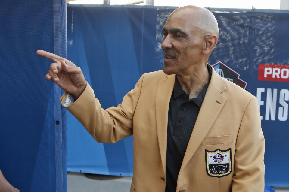 FILE - In this Aug. 3, 2019, file photo, former NFL player Tony Dungy is introduced before the induction ceremony at the Pro Football Hall of Fame in Canton, Ohio. Pro football is discovering that the spirit of the Rooney Rule is being violated. NFL Commissioner Roger Goodell made that a point of emphasis in his state of the league speech during Super Bowl week. So count on Goodell finding ways to more strongly implement the policy that requires teams to interview minority candidates for coaching and executive positions.(AP Photo/Ron Schwane, File)