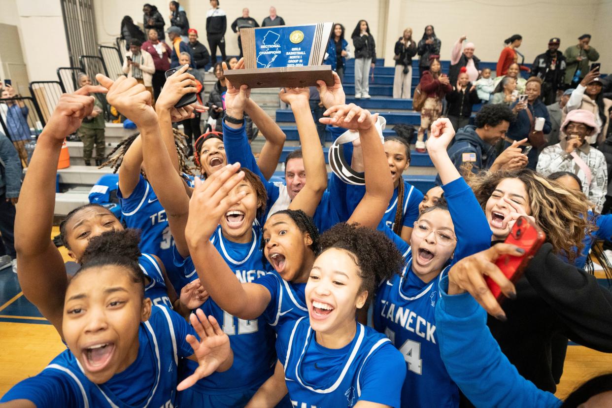 Mar 2, 2024; Teaneck, NJ, USA; Old Tappan at Teaneck in the NJSIAA North 1, Group 3 girls basketball final. Teaneck celebrates defeating Old Tappan.