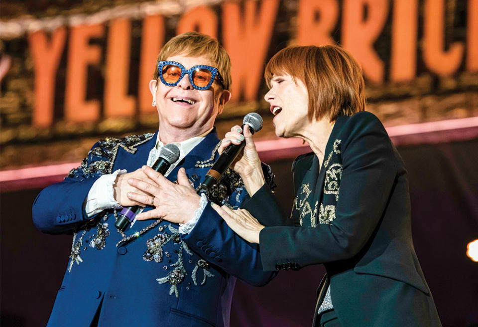 Onstage with Kiki Dee, with whom he recorded the classic duet Don’t Go Breaking My Heart.