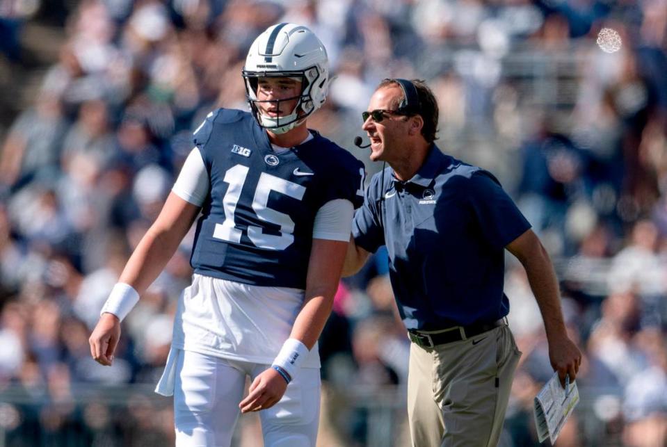 Penn State offensive coordinator Mike Yurcich talks to quarterback Drew Allar between plays during the game against Central Michigan on Saturday, Sept. 24, 2022.