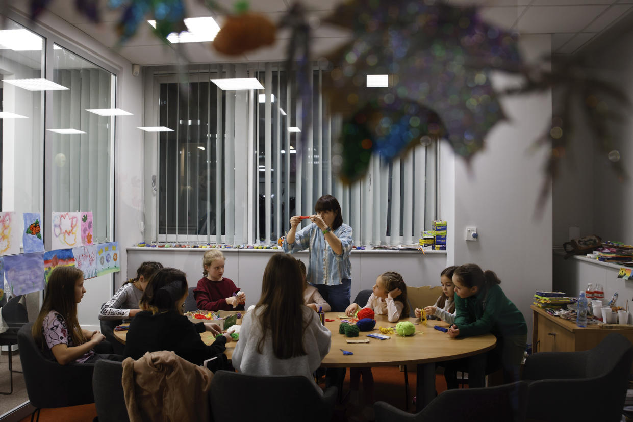 Ukrainians spend time at the UNICEF facility in Warsaw, Poland, Wednesday, Nov. 9, 2022. The U.S. Ambassador to the United Nations says she does not expect the U.S. midterm election to weaken U.S. support for Ukraine given the bipartisan support for Kyiv since Russia’s invasion of its neighbor. Linda Thomas-Greenfield spoke after she visited a UNICEF center in Warsaw that has become a hub for Ukrainian refugee children in their mothers, offering educational support and therapy. (AP Photo/Michal Dyjuk)