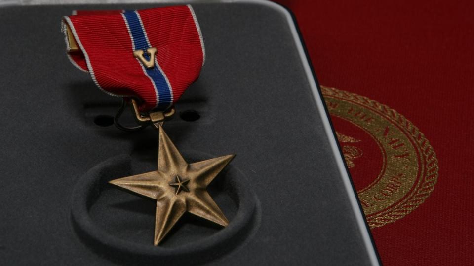 The Bronze Star Medal is given for either combat heroism or meritorious service. The bronze 
