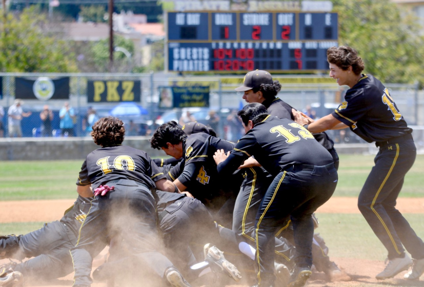 San Pedro players celebrate on the mound moments after beating El Camino Real, 7-6.