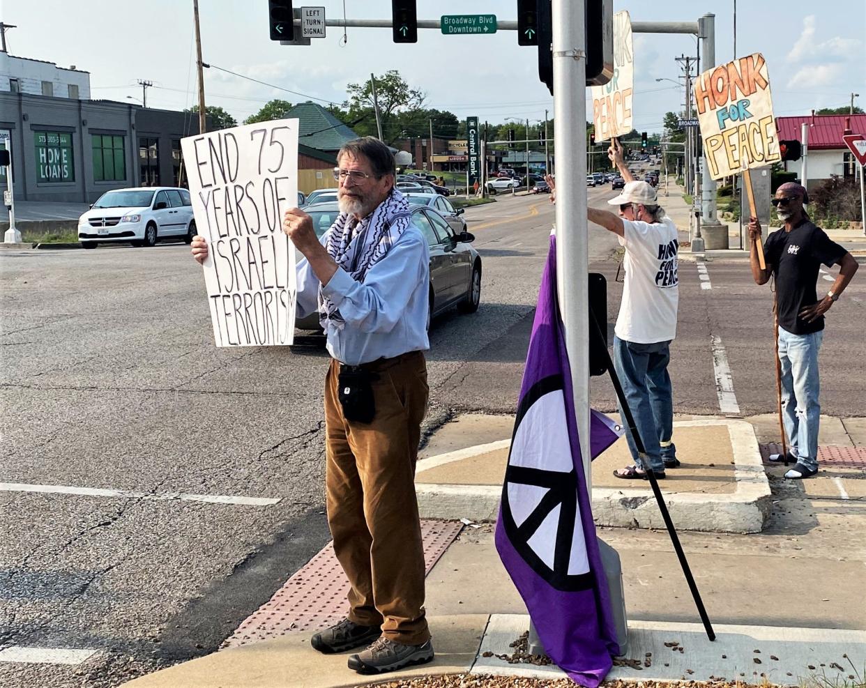 George Smith, University of Missouri professor emeritus and Nobel Prize winner, on Wednesday joined protesters at Broadway and Providence commemorating Monday's 75th anniversary of what is known as the Nakba, the forced removal of Palestinians from their towns and villages by Zionists.
