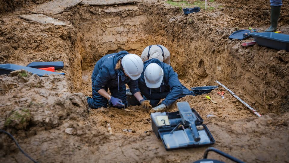 Exhumation of the mass grave in the German Military cemetery at Normandy where Nathan Baskind has been buried for 80 years. - Anibas Photography