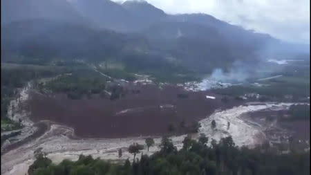 Damage done by a landslide is seen in Villa Santa Lucia, Los Lagos, Chile December 16, 2017 in this still image obtained from social media. CARABINEROS DE CHILE/via REUTERS