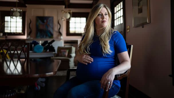 PHOTO: Lauren Miller, who had to travel to Colorado to have an abortion for one of her twins, at home in Dallas, March 5, 2023. (Nitashia Johnson/The New York Times via Redux)