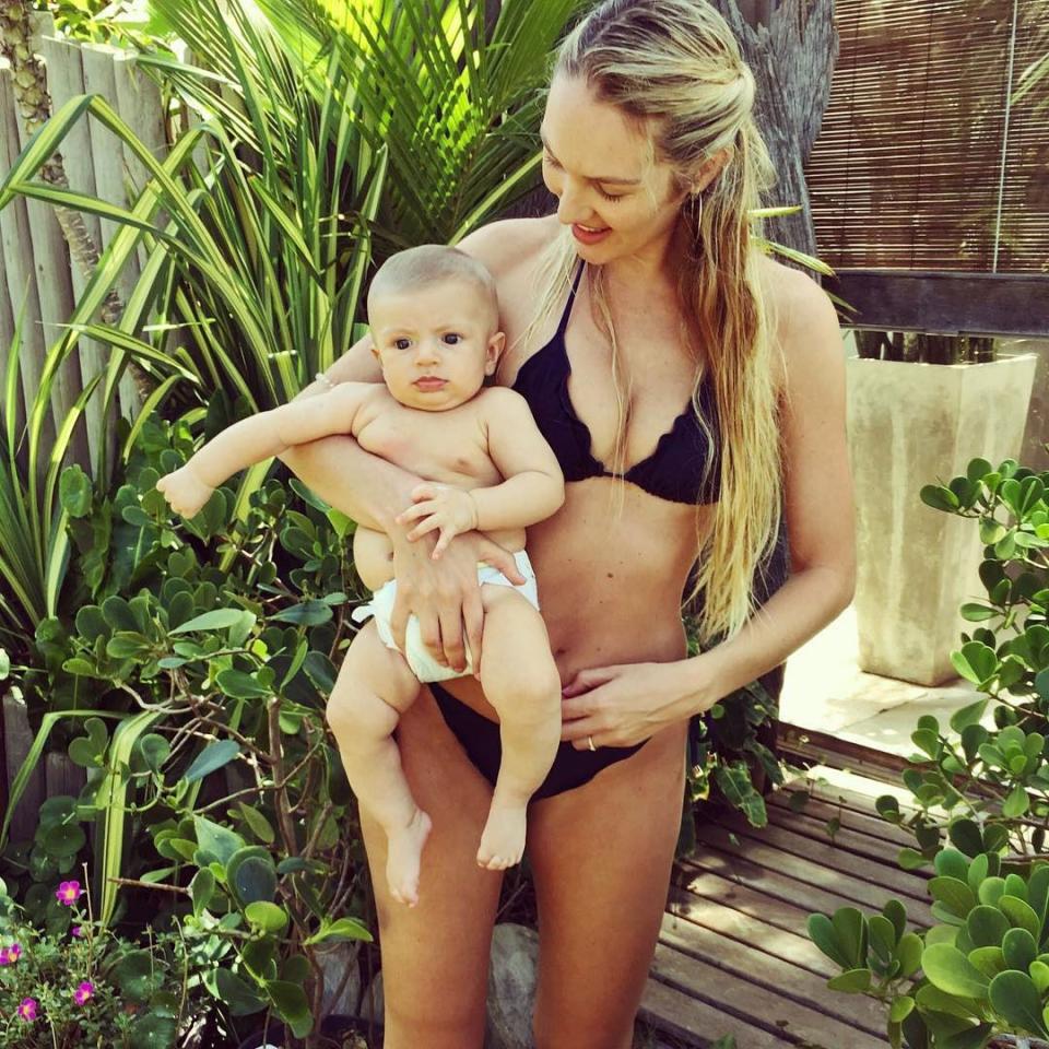 <p>It's still beach season for Candice and her lil nugget.</p>