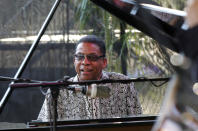 Herbie Hancock, performs at a sunrise concert marking International Jazz Day in New Orleans, Monday, April 30, 2012. The performance, at Congo Square near the French Quarter, is one of two in the United States that day; the other is in the evening in New York. Thousands of people across the globe are expected to participate in International Jazz Day, including events in Belgium, France, Brazil, Algeria and Russia. (AP Photo/Gerald Herbert)