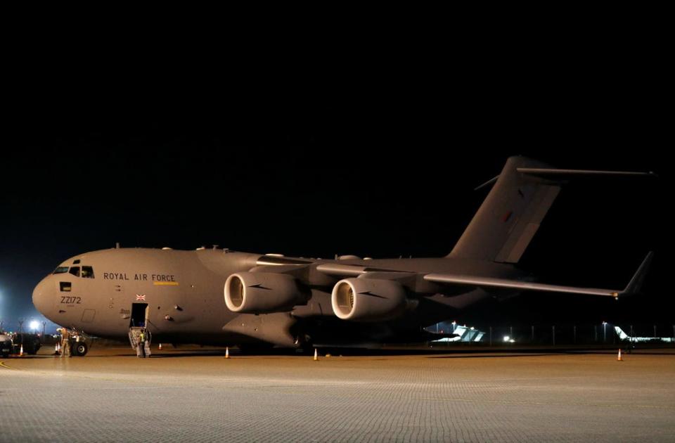 British military personnel depart a C-17 aircraft at RAF Brize Norton, Oxfordshire after the final airlift from Afghanistan (Peter Nicholls/PA) (PA Wire)