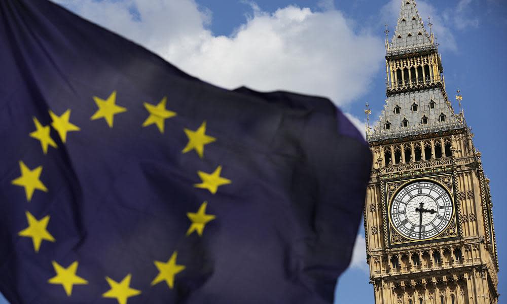 A European Union flag in front of Elizabeth Tower.