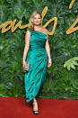 <p>The model wore an emerald one-shoulder dress at the Fashion Awards at the Royal Albert Hall. <em>[Photo: Getty]</em> </p>