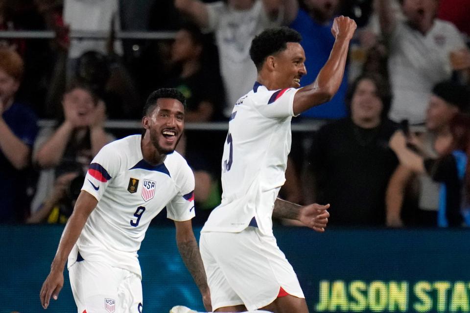 Bryan Reynolds (right) celebrates after scoring as teammate Jesus Ferreira (9) reacts during the USMNT's win over St. Kitts & Nevis on June 28 in St. Louis.