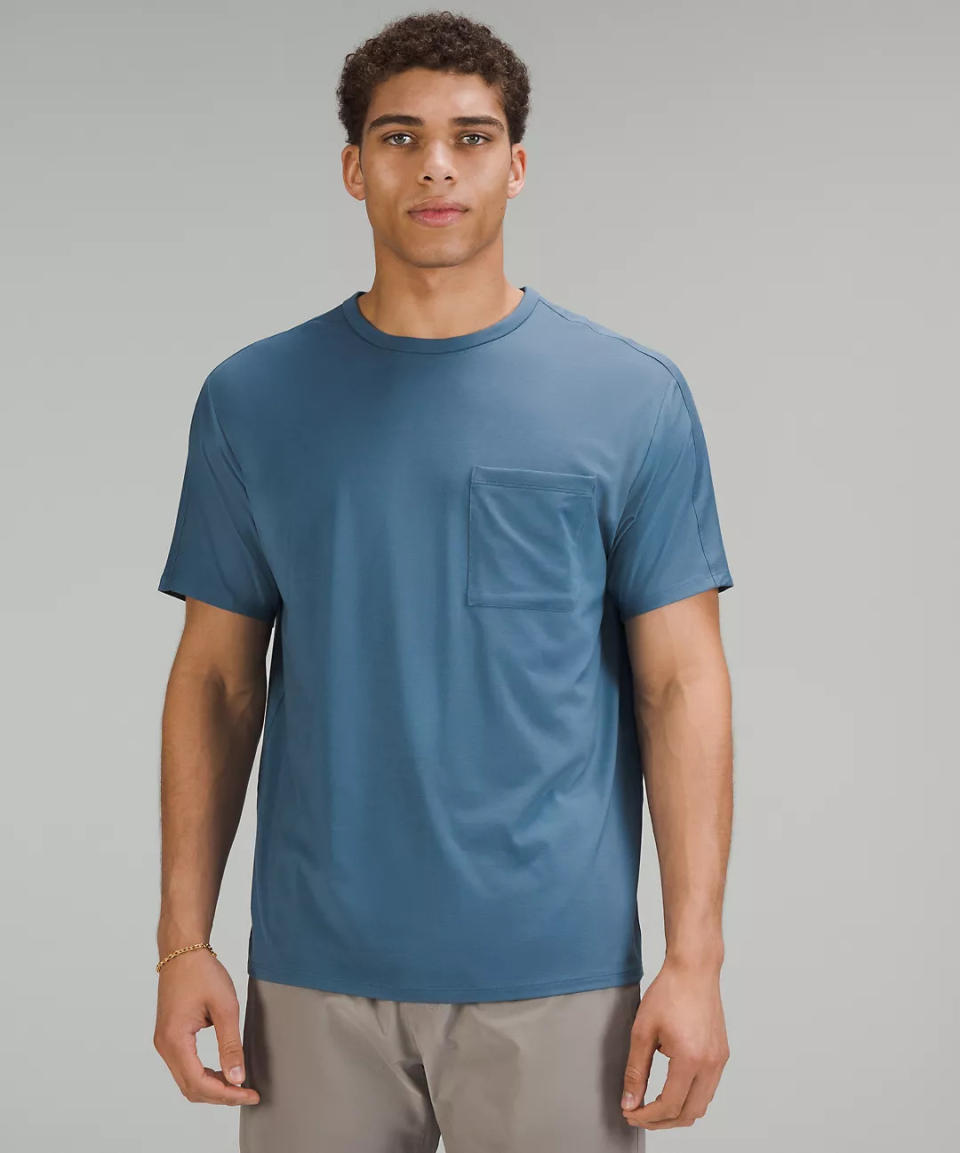 man wears blue lululemon Fundamental Pocket T-Shirt. 