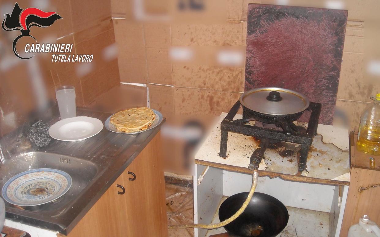 A filthy makeshift kitchen used by exploited Chinese workers