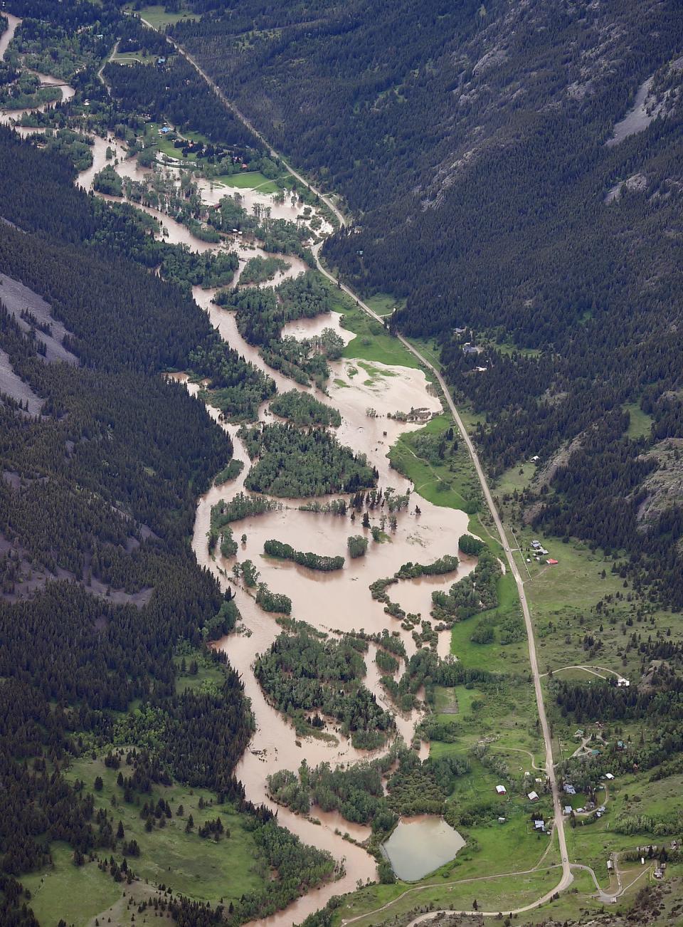 The Boulder River south of Big Timber floods roads and homes on Monday, June 13, 2022, as major flooding swept away at least one bridge, washed away roads and set off mudslides in Yellowstone National Park in Montana (AP)