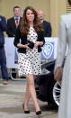 The Duchess of Cambridge attends a Warner Bros. Studio tour while pregnant in April 2013 wearing a black and white polka dot dress.