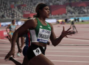 Blessing Okagbare, of Nigeria races in a women's 200 meter heat at the World Athletics Championships in Doha, Qatar, Monday, Sept. 30, 2019. (AP Photo/Nariman El-Mofty)