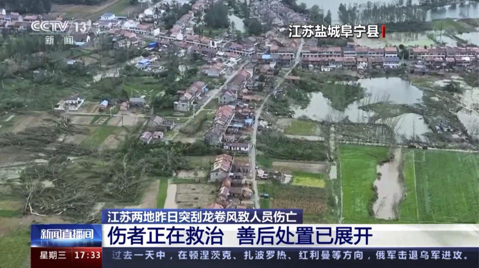 In this image taken from video footage run by China's CCTV, damaged houses and broken trees are seen in the aftermath of a tornado swept through in Yancheng city in eastern China's Jiangsu Province on Tuesday, Sept. 19, 2023. Two tornadoes within hours killed and injured several people in eastern China, state media said Wednesday. (CCTV via AP)