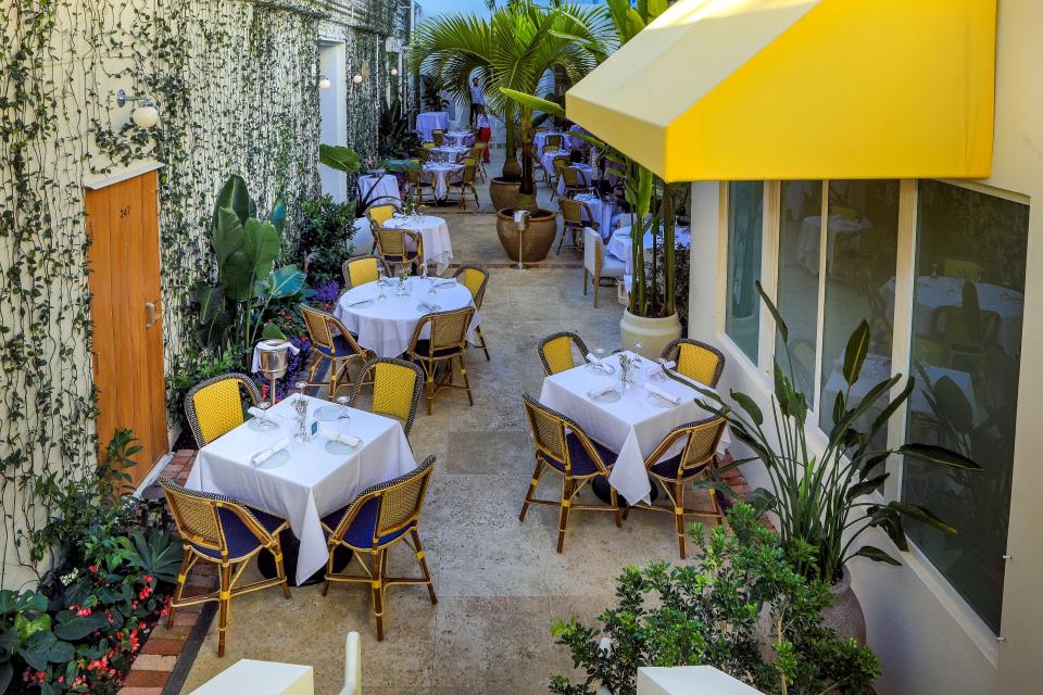 A courtyard view of Le Bilboquet restaurant in Palm Beach.