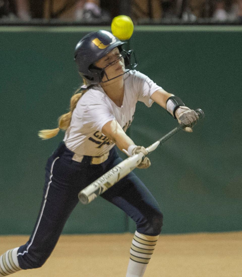 University Christian's Macie Bourgholtzer (25) hits bunt pop up for an out during the fourth inning against The First Academy in the FHSAA State 2A State Championship game at the Legends Way Ball Fields in Clermont Wednesday night. May 25, 2022. [Michael Wilson/Special to the Times-Union]