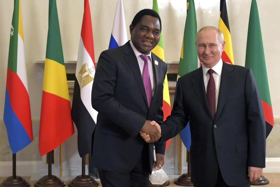 In this handout photo provided by Photo host Agency RIA Novosti, Russian President Vladimir Putin, right, shakes hands with Zambia's President Hakainde Hichilema during a meeting with a delegation of African leaders and senior officials in St. Petersburg, Russia, Saturday, June 17, 2023. Seven African leaders — presidents of Comoros, Senegal, South Africa and Zambia, as well as Egypt's prime minister and top envoys from the Republic of Congo and Uganda — traveled to Russia on Saturday a day after visiting Ukraine on a mission to try to help end the hostilities. (Evgeny Biyatov/Photo host Agency RIA Novosti via AP)