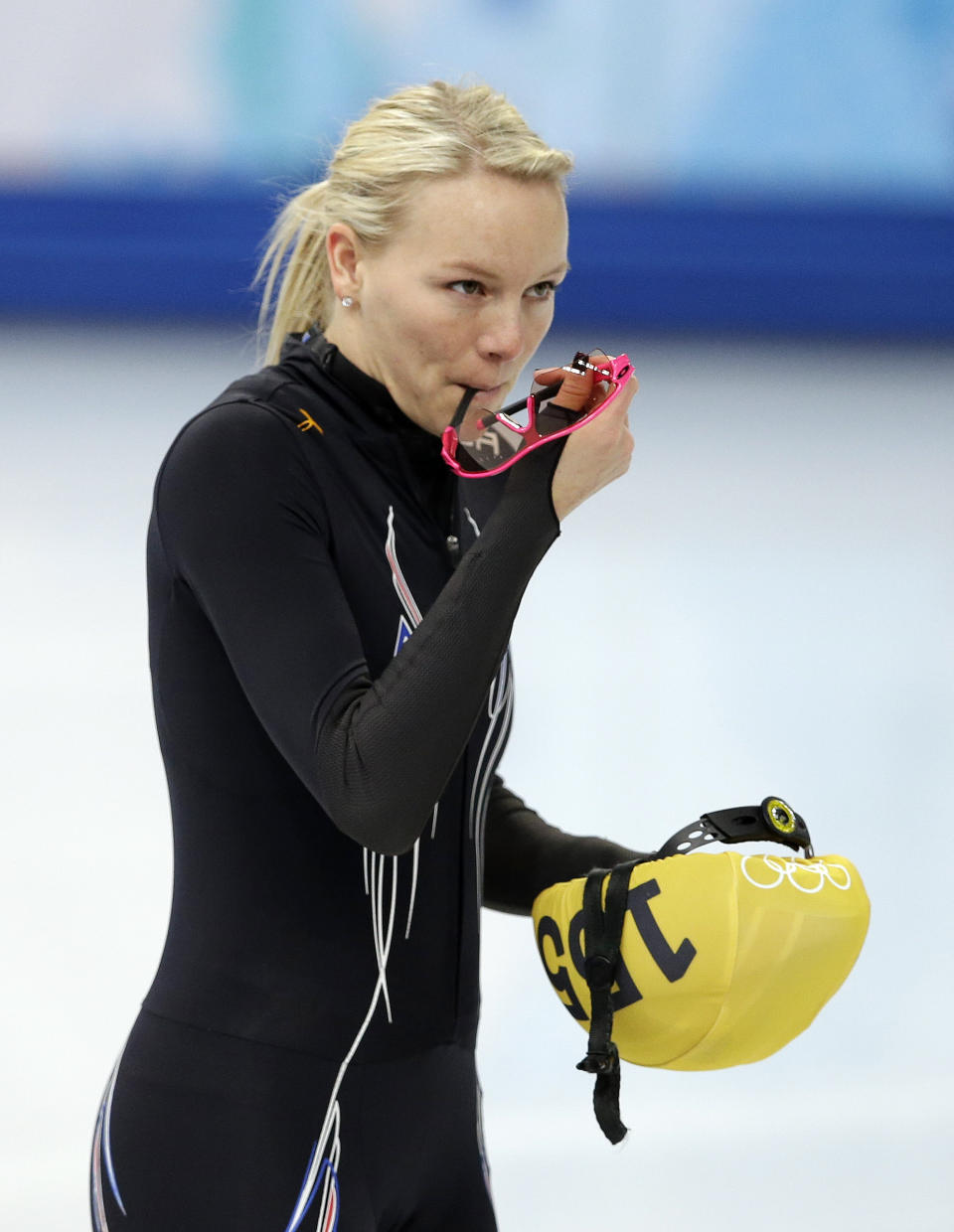 Emily Scott of the United States prepares for short track speedskating practice at the Iceberg Skating Palace during the 2014 Winter Olympics, Friday, Feb. 14, 2014, in Sochi, Russia. Scott has overcome money troubles and family strife to realize her goal of competing in the Olympics. Along the way, the 24-year-old short track skater from Springfield, Mo., has picked up hundreds of fans who shelled out as little as $5 to help her stay in training. (AP Photo/Darron Cummings)