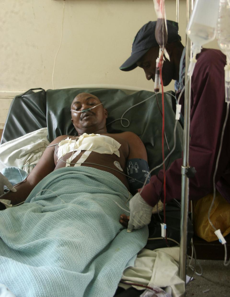 A victim receives treatment at a hospital after he was shot when gunmen attacked Hindi village, near Lamu