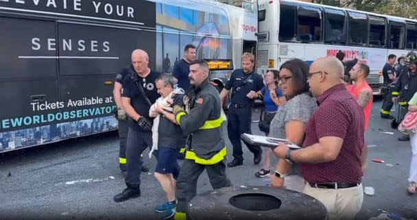 PHOTO: Injured passengers are led away from the scene of a bus crash in New York, on July 6, 2023. (WABC)