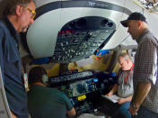 Power On has been completed for the first 787 Dreamliner. The test sequence lasted for just over a week and proved the functionality and installation of the airplane's electric systems. Running tests in the flight deck are (from left) James Townsend, aviation manufacturing technician inspector; Allen Smith, test technician; Jon Stephenson, production test manufacturing engineer; and Riger Vazquez Jr., production test team leader.