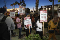 Culinary Local 226 members walk the picket lines just after 5 a.m. at the start of a 48 hour strike at Virgin Hotels in Las Vegas, Friday, May 10, 2024. About 700 workers walked off the job at a hotel-casino just off the Las Vegas Strip Friday morning in what union organizers said would be a 48-hour strike after spending months trying to reach a deal for new 5-year contract with Virgin Hotels. (K.M. Cannon/Las Vegas Review-Journal via AP)