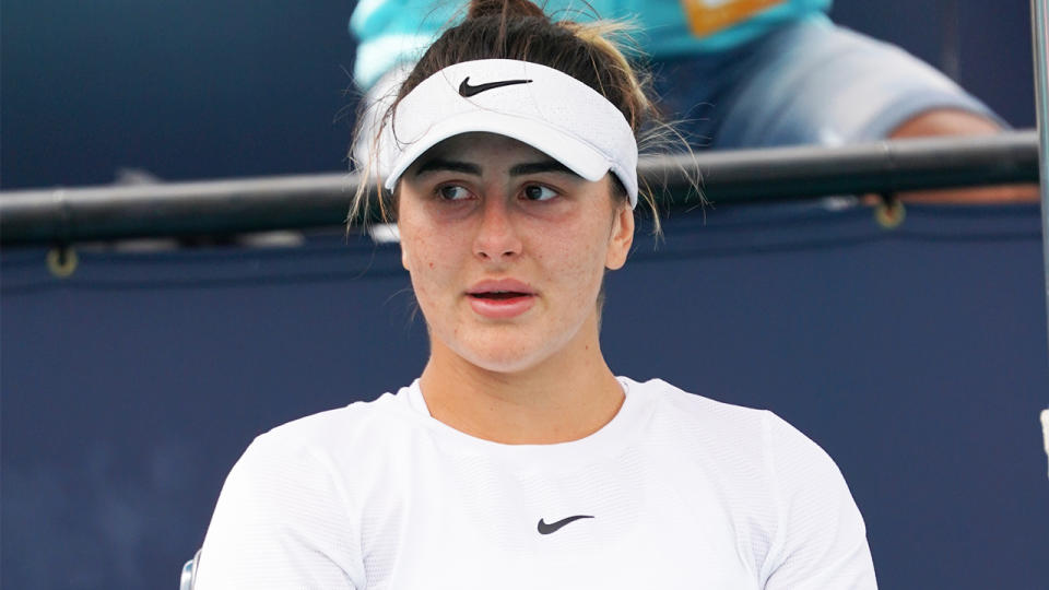 Bianca Andreescu (pictured) during a changeover during a tennis match.