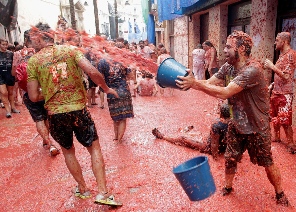 Buckets are always a favorite tool during the tomato festival.