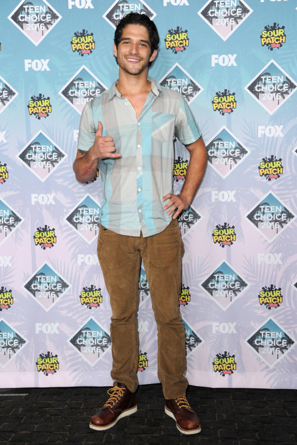 Tyler Posey in corduroy pants 