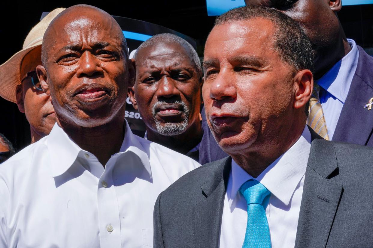 Democratic mayoral candidate Eric Adams (left) is joined by former Gov. David Paterson (right) during a campaign event on Thursday in Harlem.