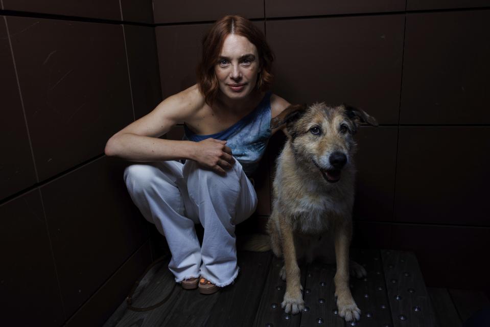 Director Laetitia Dosch and Cosmos pose for portrait photographs for the film 'Dog on Trial' at the 77th international film festival, Cannes, southern France, Saturday, May 18, 2024. (Photo by Vianney Le Caer/Invision/AP)