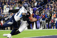 Tennessee Titans strong safety Kenny Vaccaro (24) defends as Baltimore Ravens tight end Hayden Hurst (81) makes a touchdown catch during the second half of an NFL divisional playoff football game, Saturday, Jan. 11, 2020, in Baltimore. (AP Photo/Nick Wass)