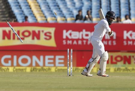 Cricket - India v England - First Test cricket match - Saurashtra Cricket Association Stadium, Rajkot, India - 10/11/16. England's Moeen Ali is bowled. REUTERS/Amit Dave