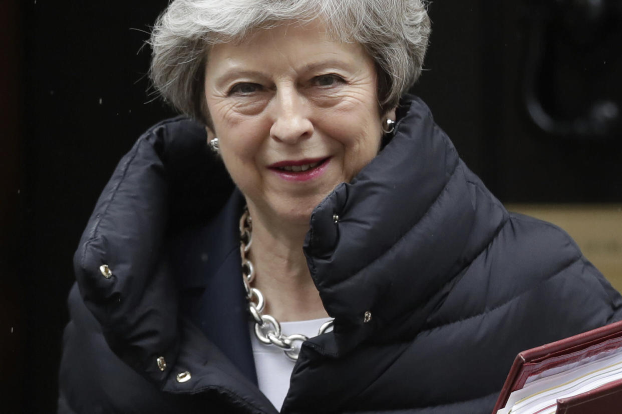 Theresa May leaves 10 Downing Street to attend Prime Minister's Questions at the Houses of Parliament. (AP Photo/Matt Dunham)