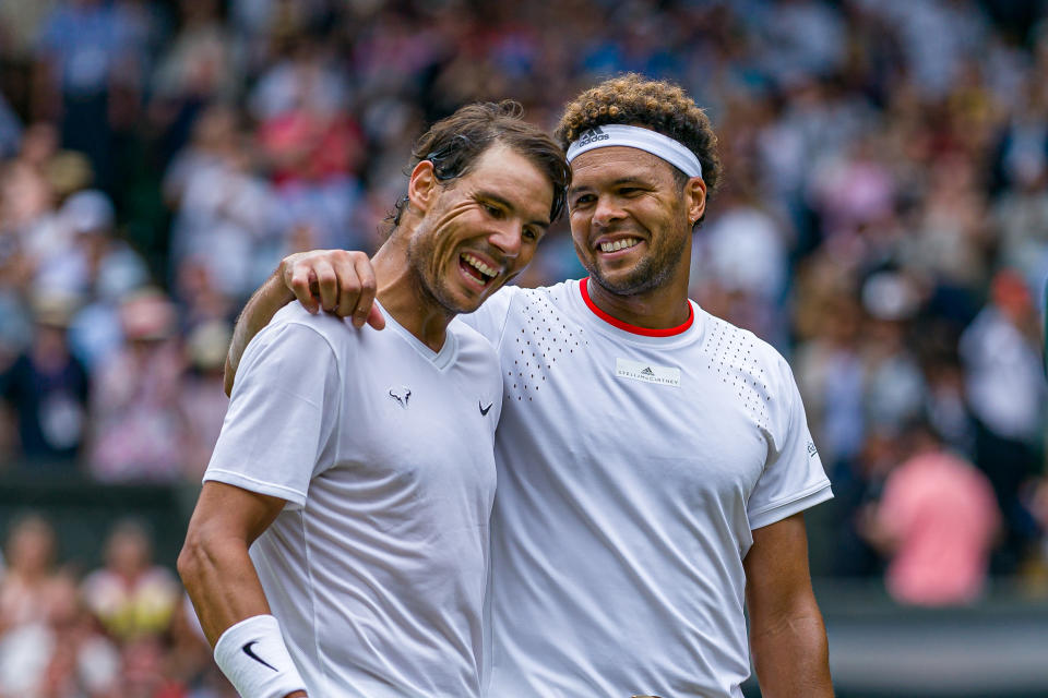 Jo-Wilfred Tsonga (pictured right) embracing Rafa Nadal (pictured left) at Wimbledon.