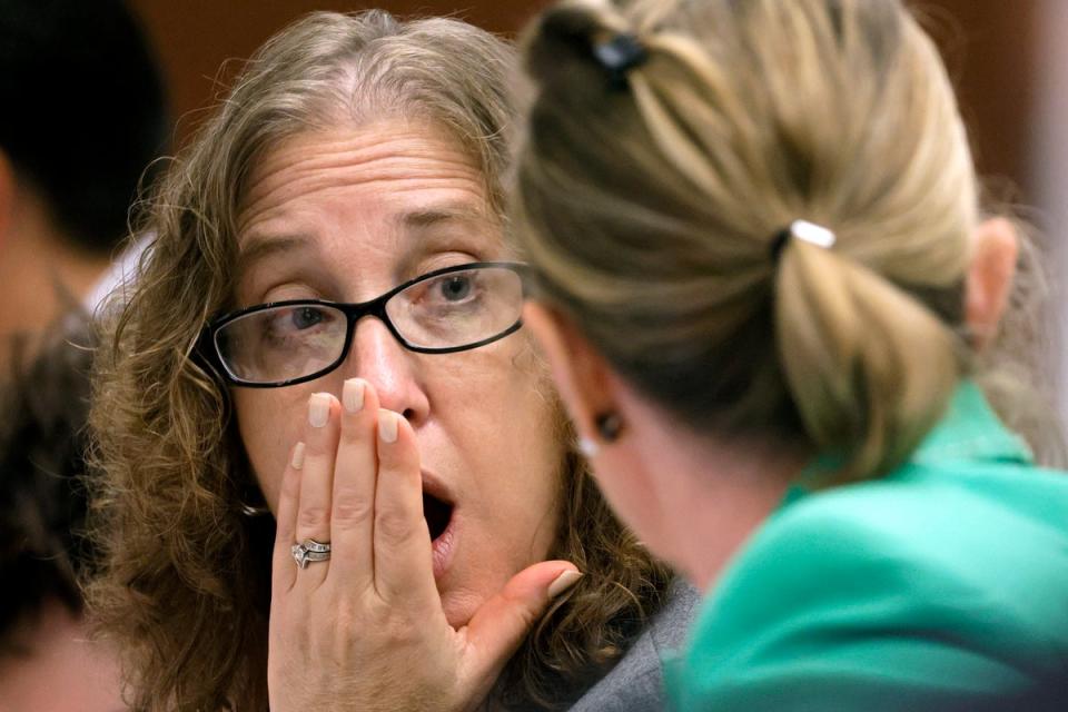 Assistant Public Defender Tamara Curtis, left, reacts to Assistant Public Defender Melisa McNeill during a break in the day's jury selection in the penalty phase of the trial of Marjory Stoneman Douglas High School shooter Nikolas Cruz (AP)