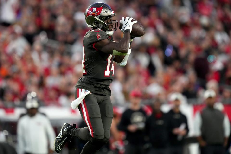 Tampa Bay Buccaneers wide receiver Chris Godwin (14) catches a pass in the second quarter during a Week 15 NFL game against the Cincinnati Bengals, Sunday, Dec. 18, 2022, at Raymond James Stadium in Tampa, Fla. 