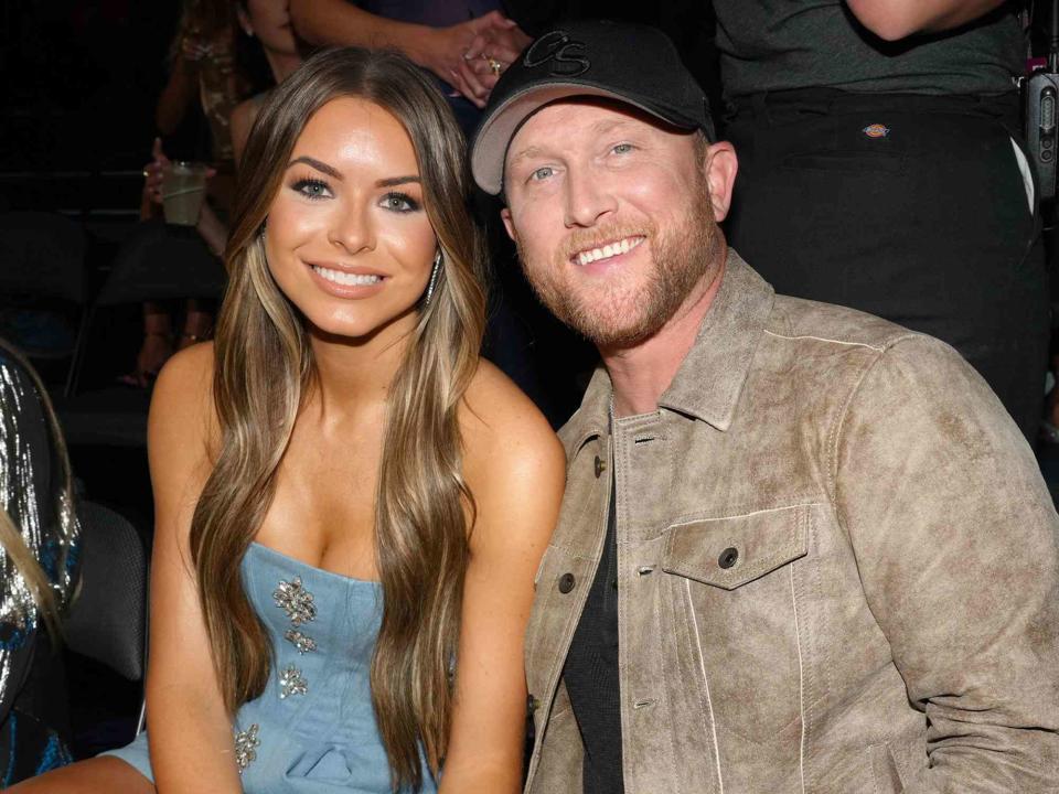 <p>Jeff Kravitz/Getty</p> Courtney Little and Cole Swindell at the 2023 CMT Music Awards in Austin, Texas.