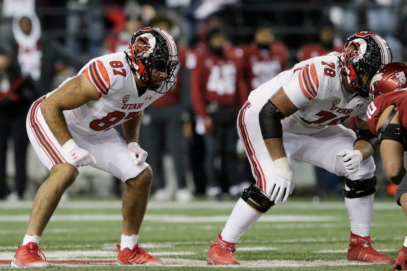 Utah tight end Thomas Yassmin (87) and Utah offensive lineman <a class="link " href="https://sports.yahoo.com/ncaaf/players/300592/" data-i13n="sec:content-canvas;subsec:anchor_text;elm:context_link" data-ylk="slk:Sataoa Laumea;sec:content-canvas;subsec:anchor_text;elm:context_link;itc:0">Sataoa Laumea</a> (78) line up for a play during game against Washington State, Thursday, Oct. 27, 2022, in Pullman, Wash. The former rugby player is hoping to take his football skills to the NFL. | Young Kwak, Associated Press