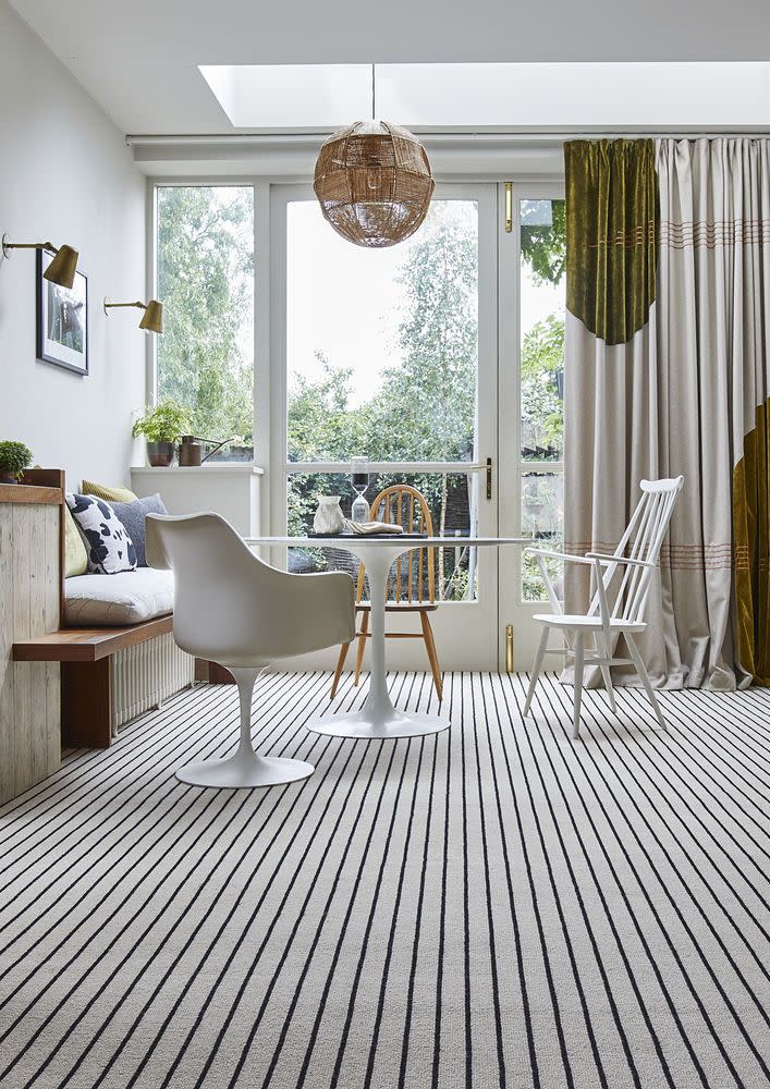 <p>Vertical stripes are a clever way to direct the eye towards interesting areas of your room. Here, a vertical stripe is used to create a visual tunnel towards some lovely outdoor views, and you can employ the same effect to highlight architectural features like an original fireplace.</p><p>Pictured: <a href="https://www.carpetright.co.uk/carpets/portobello/" rel="nofollow noopener" target="_blank" data-ylk="slk:House Beautiful Portobello Wool Carpet at Carpetright;elm:context_link;itc:0;sec:content-canvas" class="link ">House Beautiful Portobello Wool Carpet at Carpetright</a></p><p><strong>Follow House Beautiful on <a href="https://www.instagram.com/housebeautifuluk/" rel="nofollow noopener" target="_blank" data-ylk="slk:Instagram;elm:context_link;itc:0;sec:content-canvas" class="link ">Instagram</a>.</strong></p>