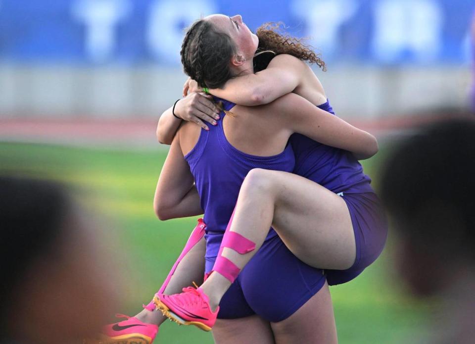 Righetti’s Riley Allen, right, jumps into a teammates arms as she celebrates her first place win in the 200 at the CIF Central Section Masters track and field meet, held at Veterans Memorial Stadium on Saturday, May 20, 2023 in Clovis.