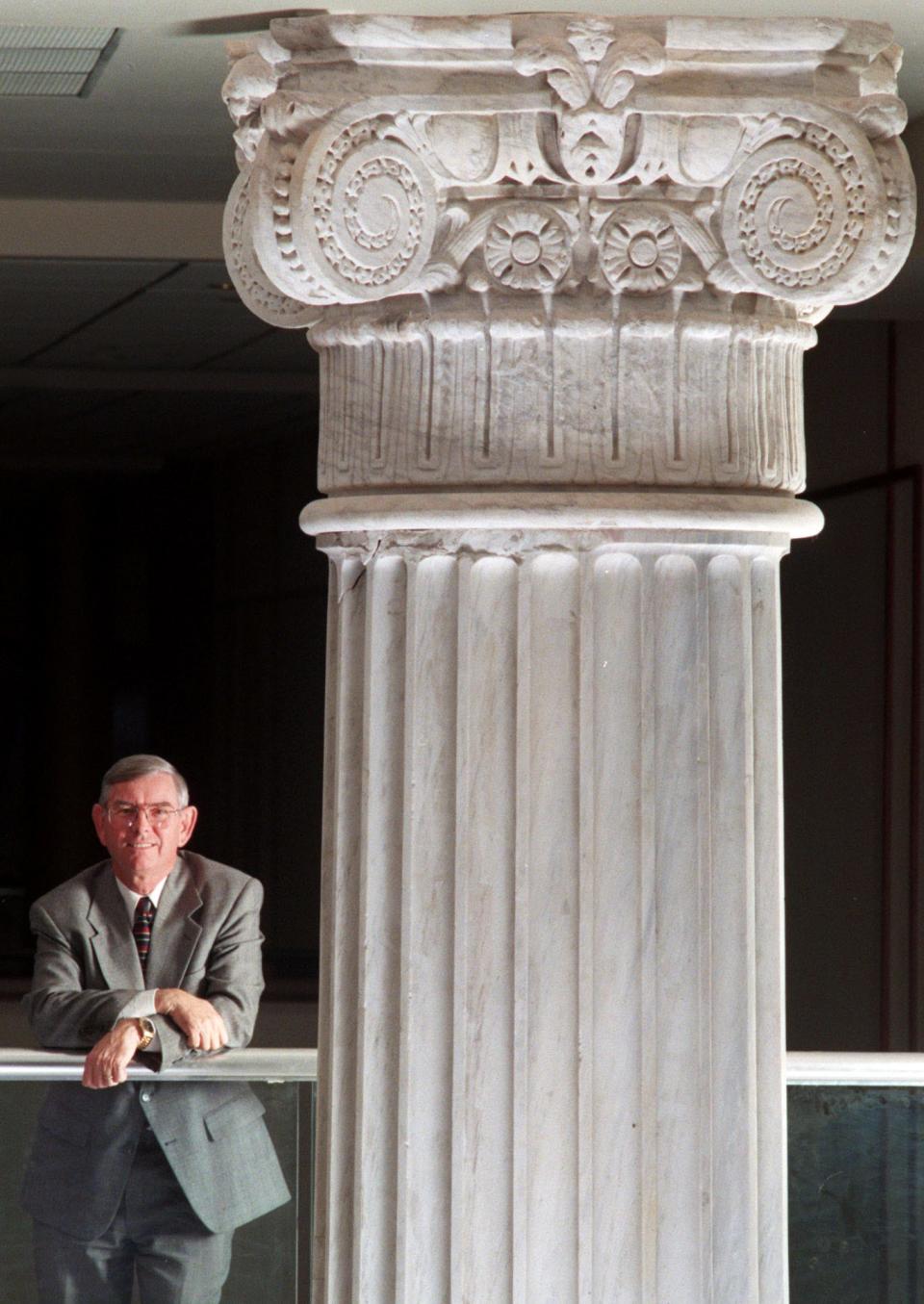 Carl Cannon, then publisher of the Florida Times-Union, poses in front of the columns in the lobby of the Times-Union Center for the Performing Arts before its opening in early 1997.